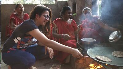 Singer Jasmine Sandlas tries cooking at a female-run dhaba, in Angels of Rock. Courtesy MTV India.