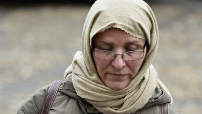 A woman holds a poster ‘I am Ahmed” during the funeral of police officer Ahmed Merabet at a Muslim cemetery on January 13, 2015 in Bobigny, France. The officers were awarded a posthumous Legion dHonneur, in recognition of their bravery. The terrorist attacks began on Wednesday with the assault on the French satirical magazine Charlie Hebdo, killing 12, and ended on Friday with sieges at a printing company in Dammartin en Goele and a Kosher supermarket in Paris with four hostages and three suspects being killed. A fourth suspect, Hayat Boumeddiene, 26, escaped and is wanted in connection with the murder of a policewoman. Pascal Le Segretain / Getty Images)