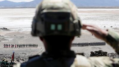 An officer salutes during a re-enactment of the battle of Canchas Blancas between Chile and Bolivia during the 1879 Pacific War, in Canchas Blancas, Potosi, Bolivia. David Mercado / Reuters