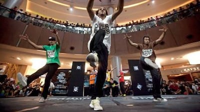 The Over Boys, from left, Lee, Junior and Mounir, won a break-dancing competition at Dubai Mall yesterday.