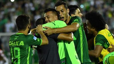 A photo taken on November 23, 2016 shows Brazil's Chapecoense goalkeeper Danilo celebrating after defeating Argentina's San Lorenzo. Nelson Almeida / AFP