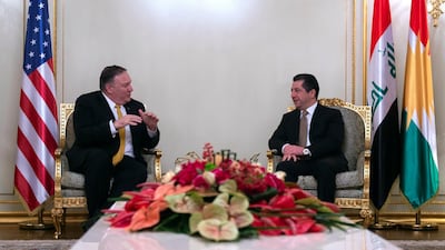 US Secretary of State Mike Pompeo, left, meets with Masrour Barzani, who was on Tuesday appointed prime minister of Iraq's autonomous Kurdistan Regional Government, in the province's capital Erbil in January 2019. AP