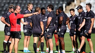 Jake White, in red, will keep the same game plan that has delivered the Sharks to the Super Rugby semi-final against the Crusaders in Christchurch, New Zealand on Saturday. Steve Haag / Getty Images