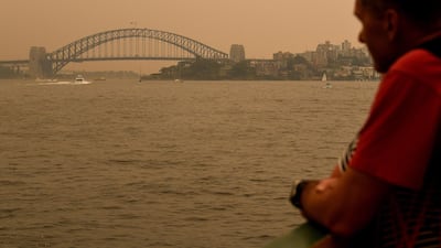 Smoke haze from bushfires in New South Wales blankets the central business district of Sydney, Australia. EPA