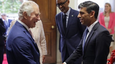 Britain's King Charles III is greeted by Prime Minister Rishi Sunak at an informal meeting with Commonwealth leaders on Friday. AFP