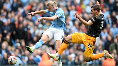Erling Haaland of Manchester City is challenged by Max Woeber of Leeds. Getty