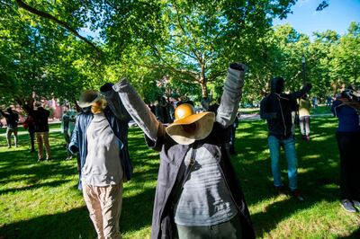 Khaled Barakeh’s installation ‘Mute’ consists of structures dressed in clothes that belong to Syrian activists currently residing in diaspora. AFP