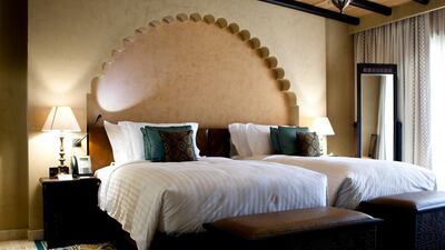 One of Qasr Al Sarab Desert Resort by Anantara's many suites (Andrew Henderson / The National)