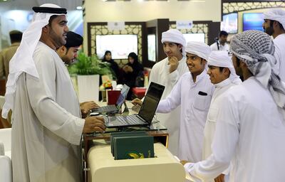 Emiratis visit a jobs fair in Fujairah. Satish Kumar / The National