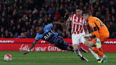 Tottenham Hotspur’s Danny Rose, left, in action against Stoke City’s Geoff Cameron. Nigel Roddis / EPA