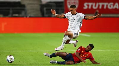 Germany's Thilo Kehrer rides a challenge from Spain's Ansu Fati. Reuters