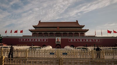 Security personnel stand guard in front of Tiananmen Gate, near the Great Hall of the People, the venue for the annual meeting of the National People's Congress in Beijing. The NPC, delayed from March by the coronavirus, opened on Friday May 22 for a week and announced the direction of policy for the year. AFP