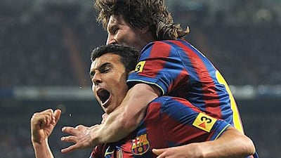 Pedro, left, and Lionel Messi are two of Barcelona's first-team players who have been taught the "Barca way" from an early age at La Maisa.