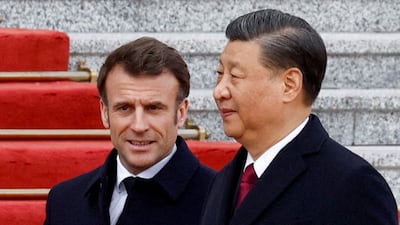 President Emmanuel Macron and President Xi Jinping in Beijing, China in 2023. Mr Xi will visit France this week. Reuters