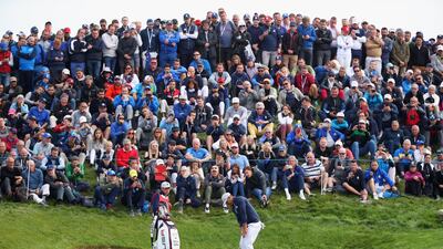 Brooks Koepka of the United States chips onto the green. Getty Images