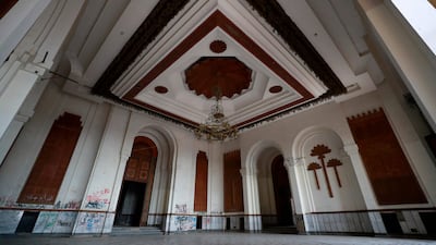 Most of his palaces were looted during the chaos of the invasion, when thieves scavenged all they could carry, even ripping electric cables out of walls.