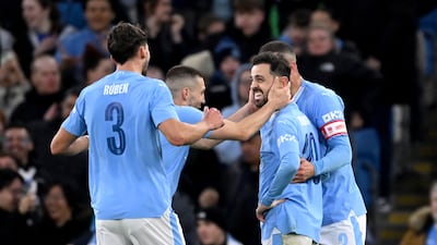 Bernardo Silva of Manchester City is congratulated after his second goal. Getty Images