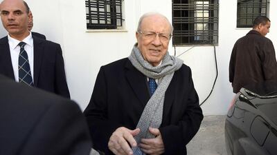 Beji Caid Sebsi, who claimed victory in Tunisia’s first free presidential election, arrives at his party’s headquarters in Tunis yesterday. The veteran politician won the country’s top job at the age of 88 for a five-year term. Fethi Belaid / AFP