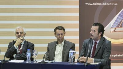 Steve Perry, FGB’s global head of debt markets, right, at the Middle East Electricity show in Dubai. Antonie Robertson / The National