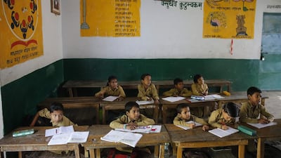 Above, children at a government-run school in Allahabad. Rajesh Kumar Singh / AP Photo