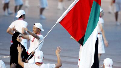 Sheikha Maitha bint Mohammed bin Rashid had the honour of carrying the flag for the UAE at the opening ceremony of the 2008 Beijing Olympics. Andre Forget / The National