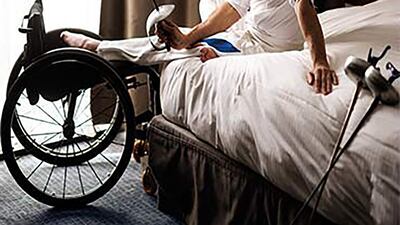Social commentary photographer Stephanie Lacombe captured an Olympic fencer and his wheelchair for Silence