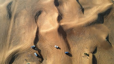 A convoy of 23 vehicles scoured five square kilometres of desert during their clean up.