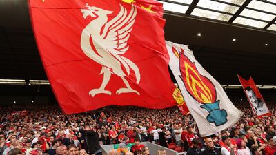Liverpool fans show their support prior at Anfield. Getty