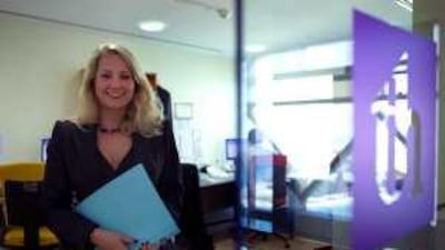 Louisa Lynch, a trainee lawyer for Trowers & Hamlins in Abu Dhabi, is trying to strike a balance between paying off her student loans, building up a cash buffer and investing in her first medium-to-long-term assets.