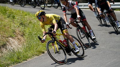UAE Team Emirates rider Tadej Pogacar in yellow.