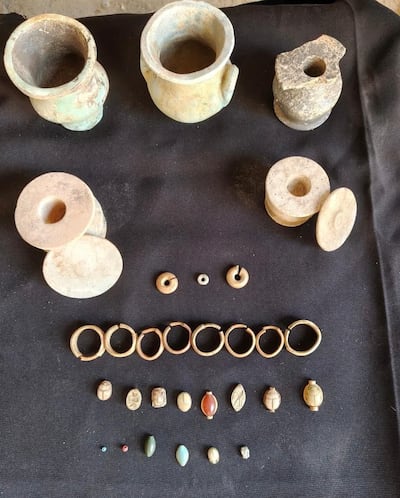 Some of the funerary objects found at the at ancient burial site in Cairo. Photo: Egyptian Ministry of Tourism and Antiquities