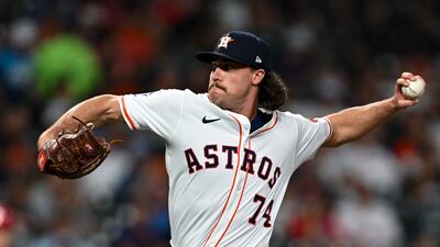 Houston Astros relief pitcher Bryan King in action against the Philadelphia Phillies at Daikin Park, Houston. Reuters