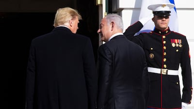 US President Donald Trump (left) greets Prime Minister of Israel Benjamin Netanyahu (right) upon his arrival at the South Portico of the White House, in Washington. EPA