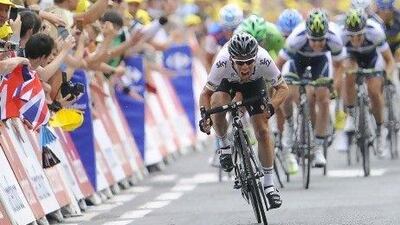 Mark Cavendish celebrates on the finish line at the end of the 222.5-km 18th stage of the Tour de France. Lionel Bonaventure / AFP