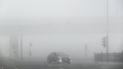 Heavy morning fog envelopes Dubai around The Springs. Antonie Robertson / The National.