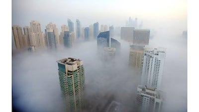 Morning fog descends over Dubai Marina. Researchers are looking into fog farming as a means to providing usable water.