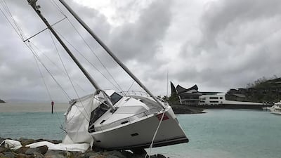 A yacht washed up at the marina on Hamilton Island after the area was hit by Cyclone Debbie Jon Clements/AFP