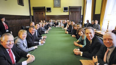 While Ed Miliband was Labour leader Burnham served as Shadow Secretary of State for Health and Shadow Secretary of State for Education. Burnham is seen here (middle left) during Miliband's first shadow cabinet meeting in October 2010.