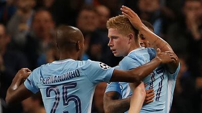 Kevin De Bruyne, right, scored a stunning goal to open the scoring for Manchester City against Shakhtar Donetsk. Lee Smith / Reuters