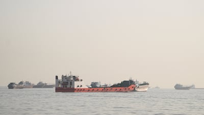 Vessels anchored in the Strait of Hormuz, as seen from Oman. The waterway remains a volatile place for seafarers. Reuters