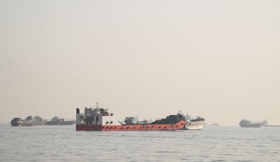 Vessels anchored in the Strait of Hormuz, as seen from Musandam, Oman. Reuters