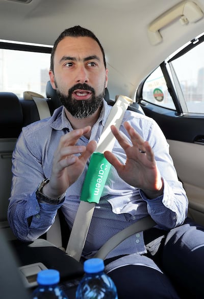 Bassel Al Nahlaoui, managing director of Careem Gulf, in a Careem taxi. Pawan Singh / The National