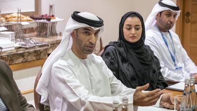 Dr Thani Al Zeyoudi, Minister of Climate Change and Environment, hosts a roundtable with journalists at the Irena conference on Sunday. Antonie Robertson / The National