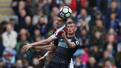 West Bromwich Albion's Chris Brunt in action with Burnley's Stephen Ward. Phil Noble / Reuters