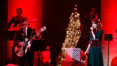 M Ward and Zooey Deschanel of She & Him perform at the Ryman Auditorium on December 8, 2021 in Nashville, Tennessee. AFP
