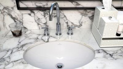 The interiors are the work of New York-based design company Meyer Davis and combine plenty of wow-factor and handcrafted materials to complement the generous open space. Chris Whiteoak / The National