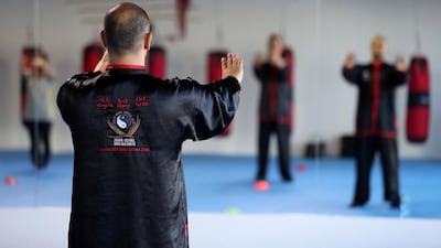 All movements done in a tai chi class serve as effective counter-attacks when done at a quicker pace. Chris Whiteoak / The National