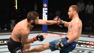 Justin Gaethje kicks Khabib Nurmagomedov. Getty