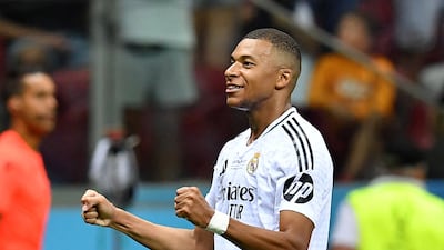 Kylian Mbappe celebrates after scoring on his Real Madrid debut. Reuters