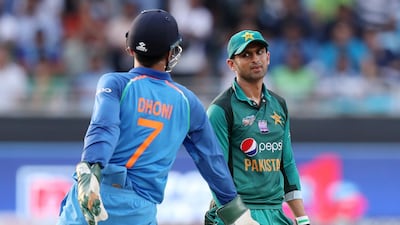 Pakistan's Shoaib Malik stares at India's MS Dhoni during the game.